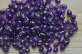 Amethist gefacetteerde ronde briolettes ca. 4 x 6 mm A klasse per stuk