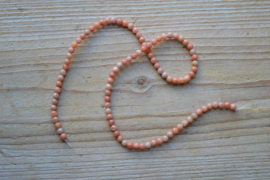 Oranje Calciet ronde kralen ca. 4 mm