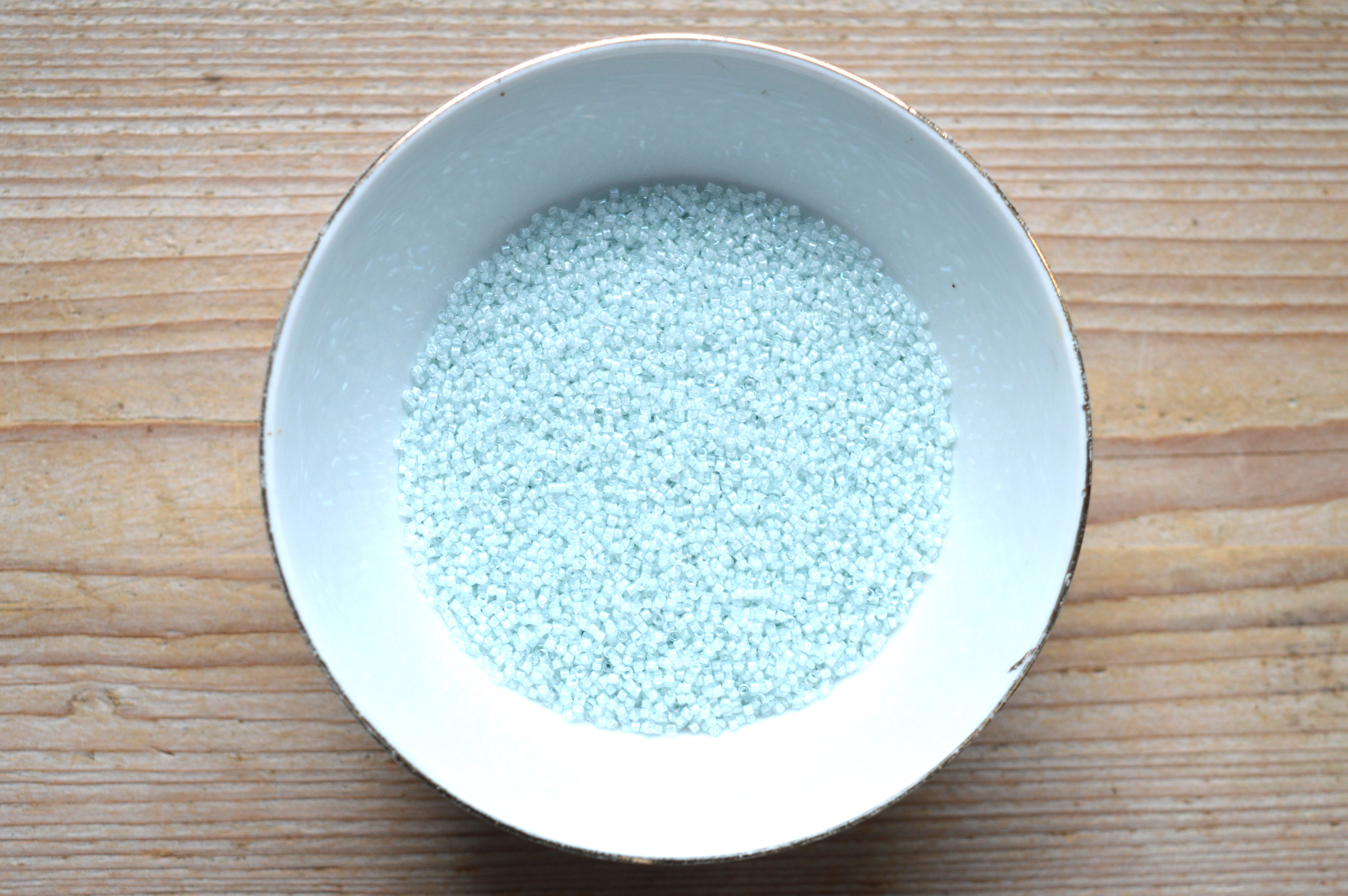 Miyuki Delica’s 11-78 Lined Luster Crystal Aqua Mist (per 5 gram)