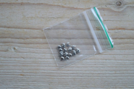 Metalen knijpkraalverbergers ca. 3 mm 20 stuks