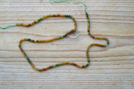 Toermalijn groen/geel gefacetteerde ronde kralen ca. 3 mm (seedbeads)