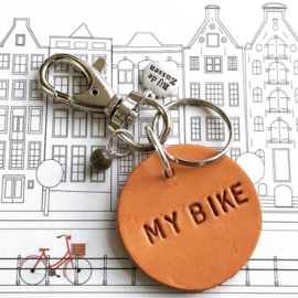 Sleutelhanger leren cirkel met tekst: my bike, my home of my car