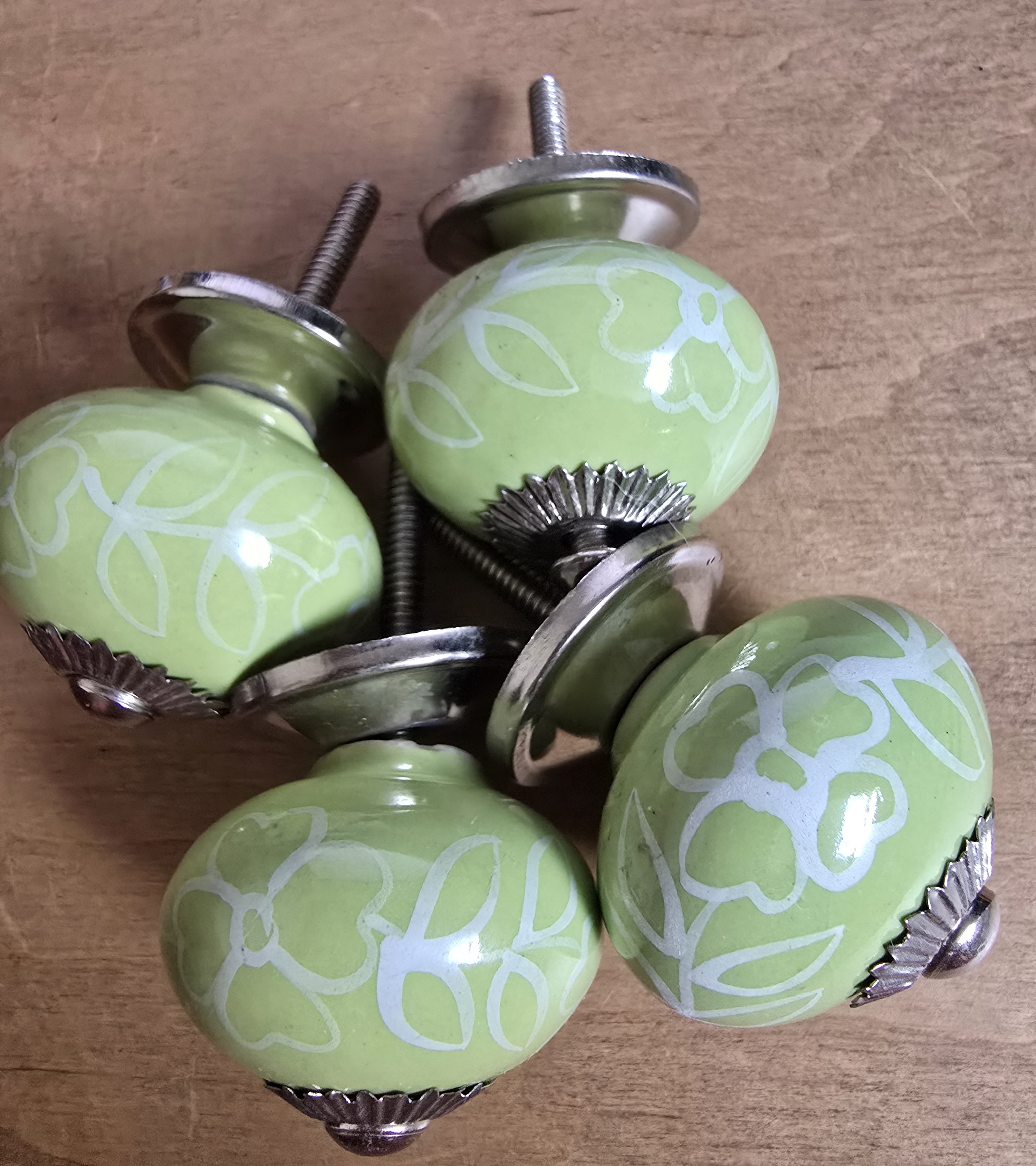 Groene porseleinen meubelknop kastknop met witte print