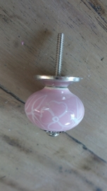 Ronde roze porseleinen meubelknop met wit bloemmotief