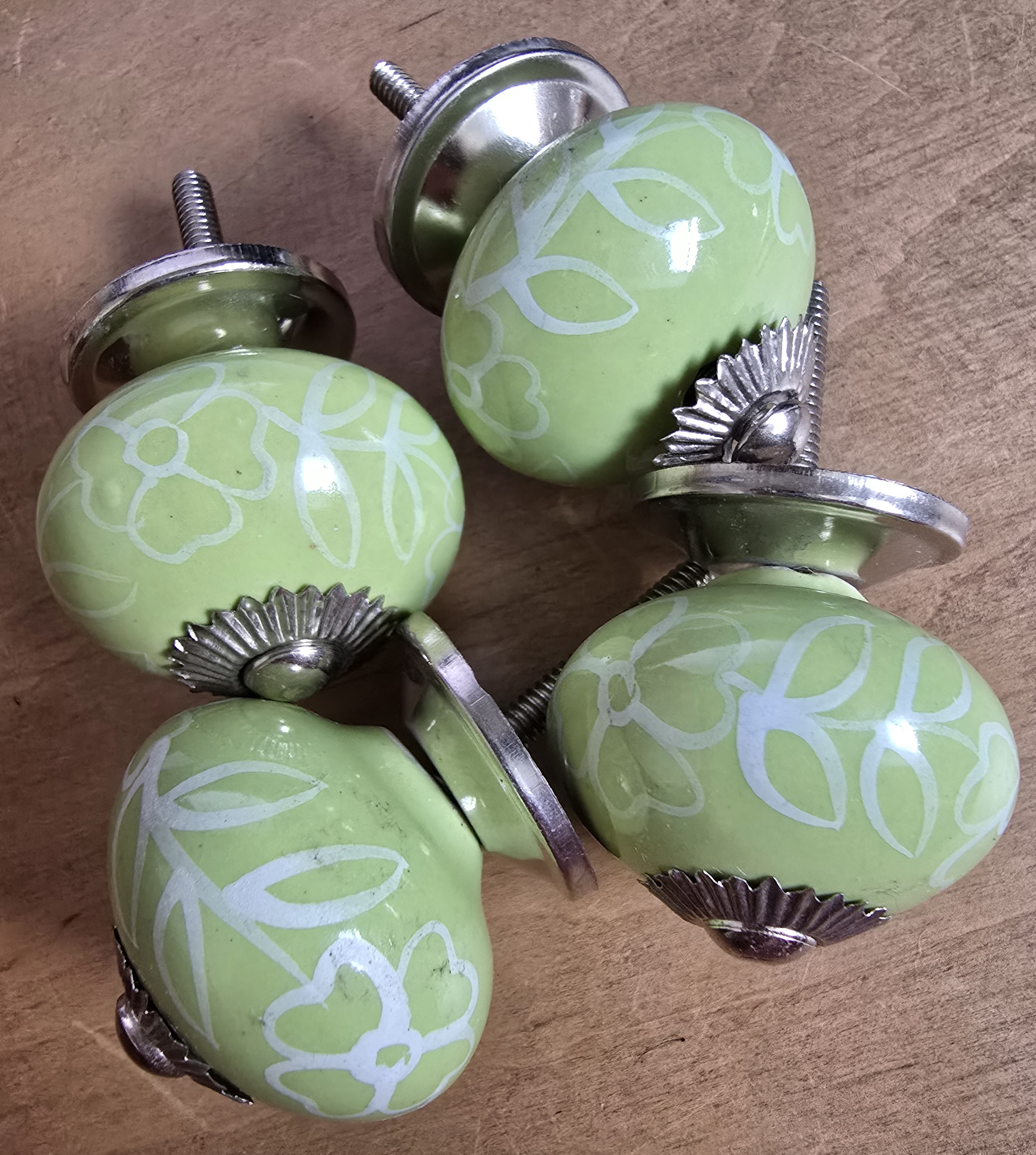 Groene porseleinen meubelknop kastknop met witte print
