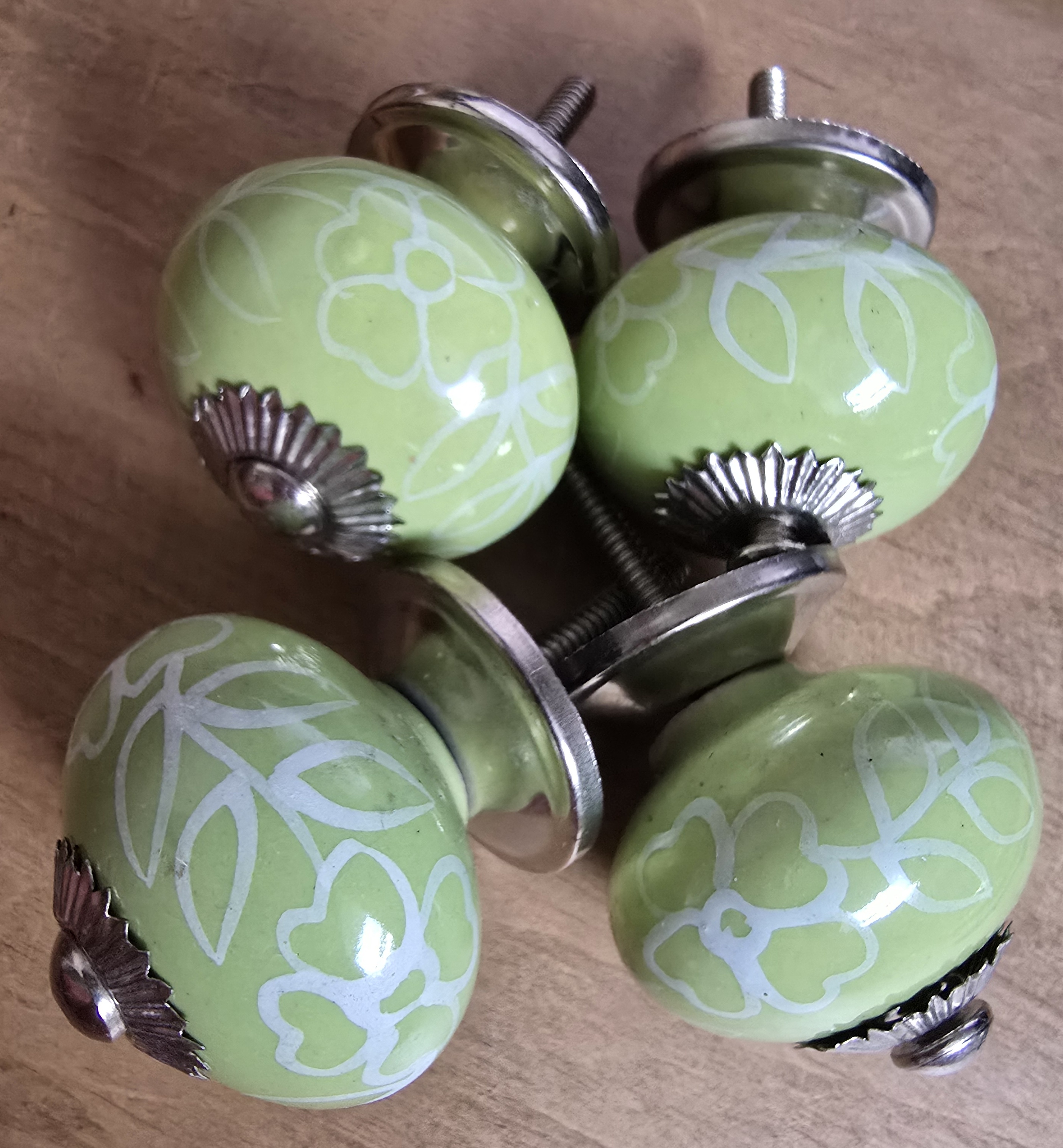Groene porseleinen meubelknop kastknop met witte print