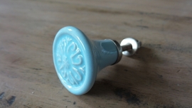 Lichtblauwe porseleinen meubelknop met printje