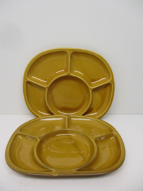 Sèvres fondue bord in bruin. / Sèvres fondue plate in brown.