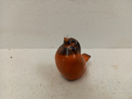 Oranje vogeltje voor in een wandrekje / Orange bird for in a wall rack