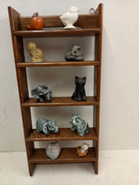 Oranje vogeltje voor in een wandrekje / Orange bird for in a wall rack