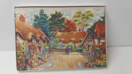 Wooden jig-saw  puzzel landhuizen met bloementuinen 25 x 36 cm.