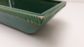 Een plantschaal in groen. / Planter in green.