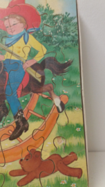 Jig-saw puzzel jongetje op hobbelpaard / Jig-saw puzzle boy on rocking horse