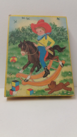 Jig-saw puzzel jongetje op hobbelpaard / Jig-saw puzzle boy on rocking horse