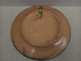 Bord met man op een kameel 23 cm. / Plate with man on a camel 23 cm.