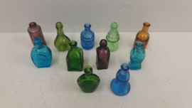 Glazen flesjes voor wandrekje / Small little bottles for wall rack