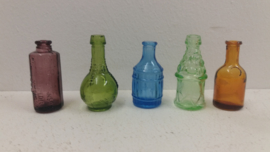 Glazen flesjes voor wandrekje / Small little bottles for wall rack