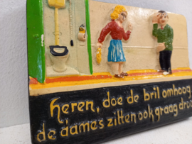 Spreukentegeltje  " Heren doe de bril omhoog de dames zitten ook graag droog " "