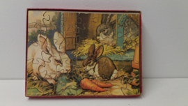 Jig-saw puzzel met konijnen 21 x 28.5 cm. / Jig-saw puzzle with rabits 8.2 x 11.2