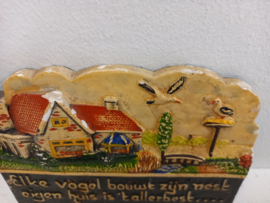 Spreukentegeltje  " Elke vogel bouwt zijn nest eigen huis is het allerbest "
