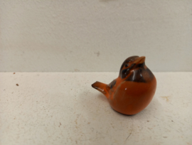 Oranje vogeltje voor in een wandrekje / Orange bird for in a wall rack