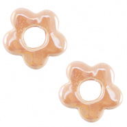 Keramiek kralen roze blush bloem 21-24 mm