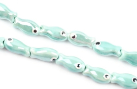 Keramiek kralen turquoise vis