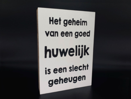 Tekstblok : Het geheim van een goed huwelijk is een ....