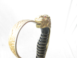 German Wehrmacht sword with lion head and red stones as eyes. Duits Wehrmacht sabel, geen maker, met leeuwenkop en 2 rode stenen als ogen zeer nette staat worden steeds moeilijker om te vinden.