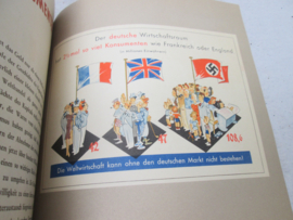 Duits propaganda boek Der Wirtschaftskrieg in Bildern. kleurrijk boek met vele afbeeldingen.