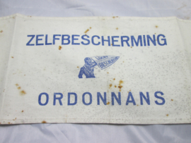 Dutch bracelet civil defence.  Nederlandse armband van de Luchtbescherming, Zelfbescherming ORDONNANS. leuk met afbeelding.