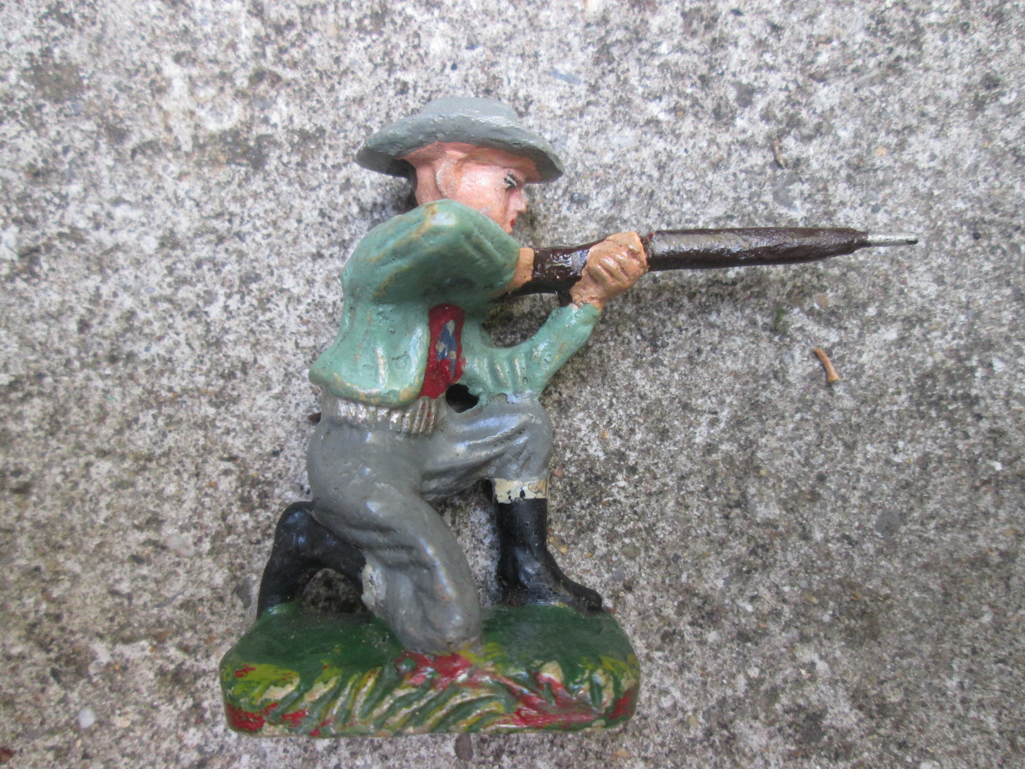 DURSO cowboy with rifle, knielende schutter met geweer