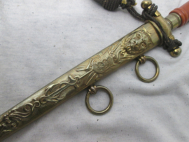 Danish naval dagger with dress knot. Deense marine ponjaard, sierdolk, met troddel. zeer nette staat. voorzien van de drie leeuwen, symbool voor denemarken.