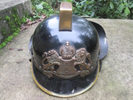 Dutch fire helmet city of Amsterdam 1960. Brandweerhelm Amsterdam met brons helm embleem apart stuk 1960.