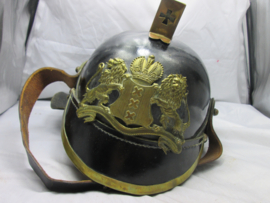 Leather fire department helmet of the City of Amsterdam. Leren Amsterdamse brandweerhelm. zeer nette staat, met brandweerstempel aan de binnenkant.