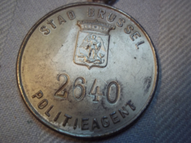 Belgium police indentification badge. Belgische politie penning 2 talig, van de stad Brussel, met nummer