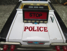 Tin toy mechanical batteries, Police car making noise sirene and light flashlight and STOP sign. Made in Japan Blikken politieauto werkend zwaailamp sirene, stop bord op batterijen. DAIYA Highway Patrol.