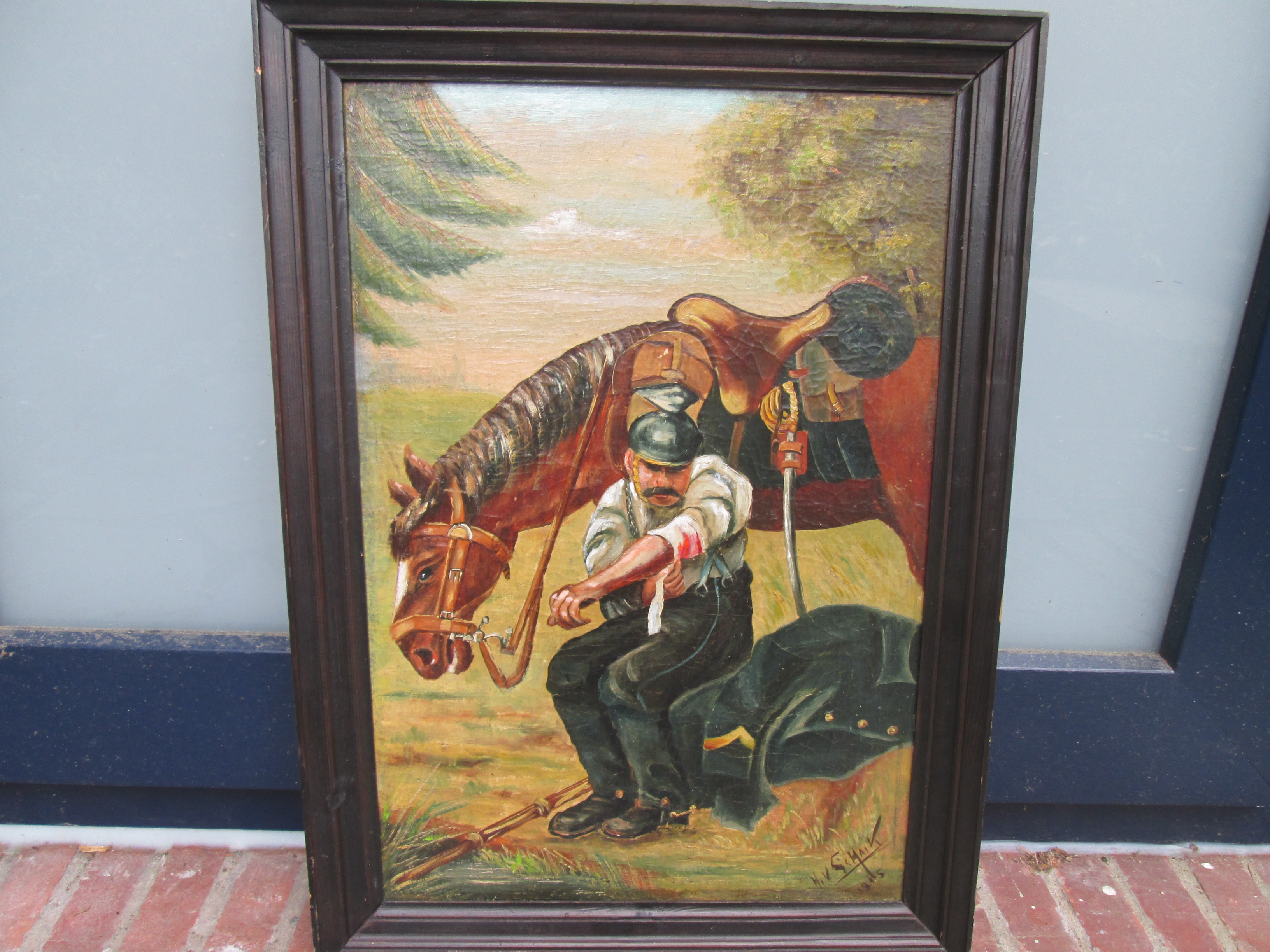 Painting on wood. Schilderij olieverf op paneel gesigneerd H.v.Schaik 1915, Een Ulaan verbind zijn verwonding, mooi apart geschilderd oorlogs tafereel