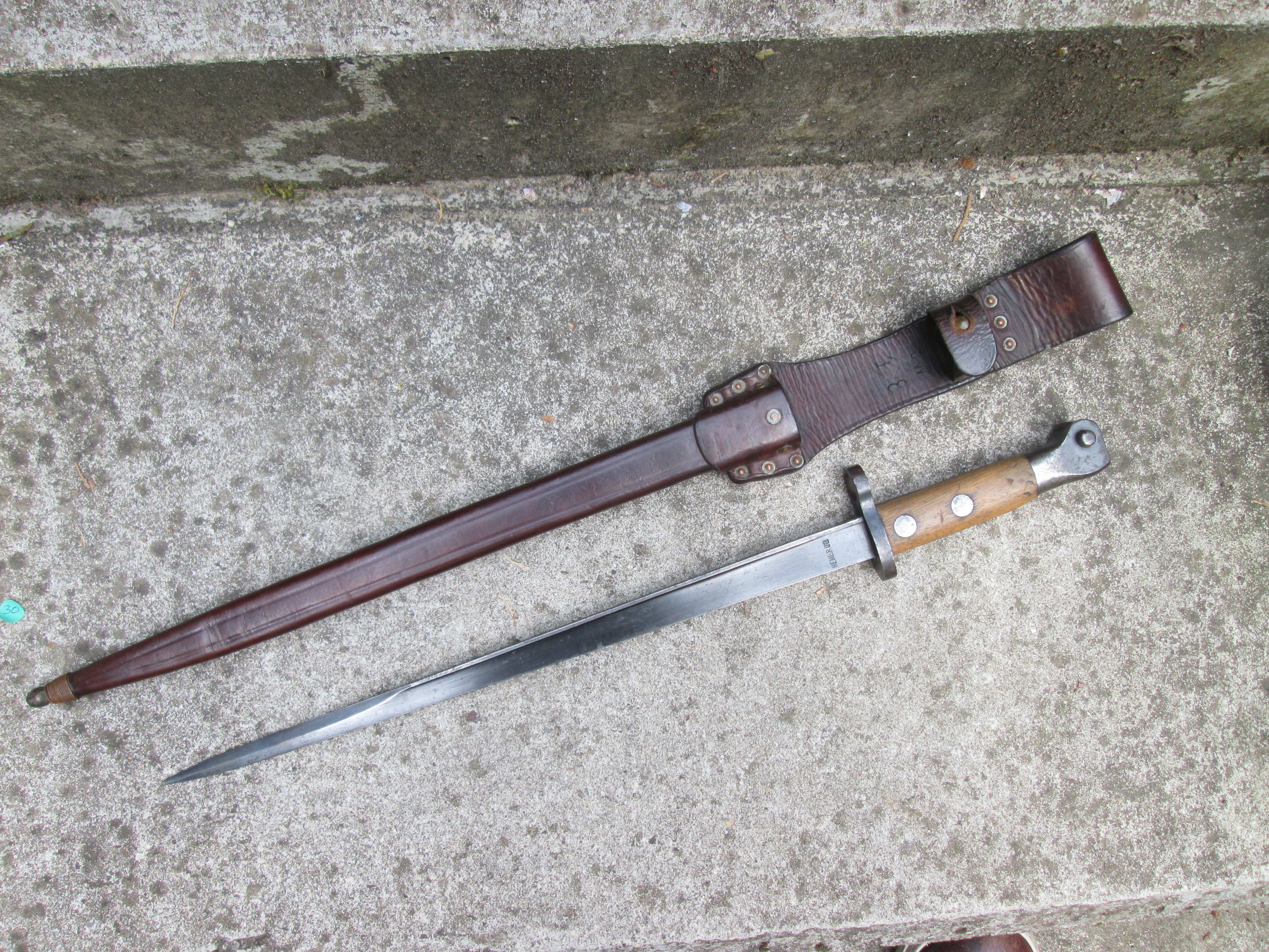 Dutch HEMBRUG bayonet with leather scabbard.
