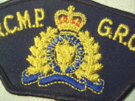 Sleeve badge Royal Canadian Mountain Police. Mouwembleem Canadeese politie Mounties