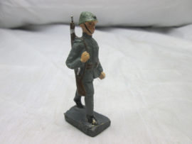 DURSO toy soldier, Dutch soldier. Speelgoed soldaatje Nederlandse militair 1935-1940 met typische helm met plaat zeer nette staat bijna mint.