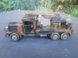 German Tippco Military truck with canon. working order. Duits blikken vrachtwagen camouflage met kanon, werkend zeer goede staat bijzonder stuk.