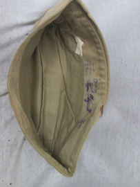 US side- cap. US Army muts US AIR Corps.