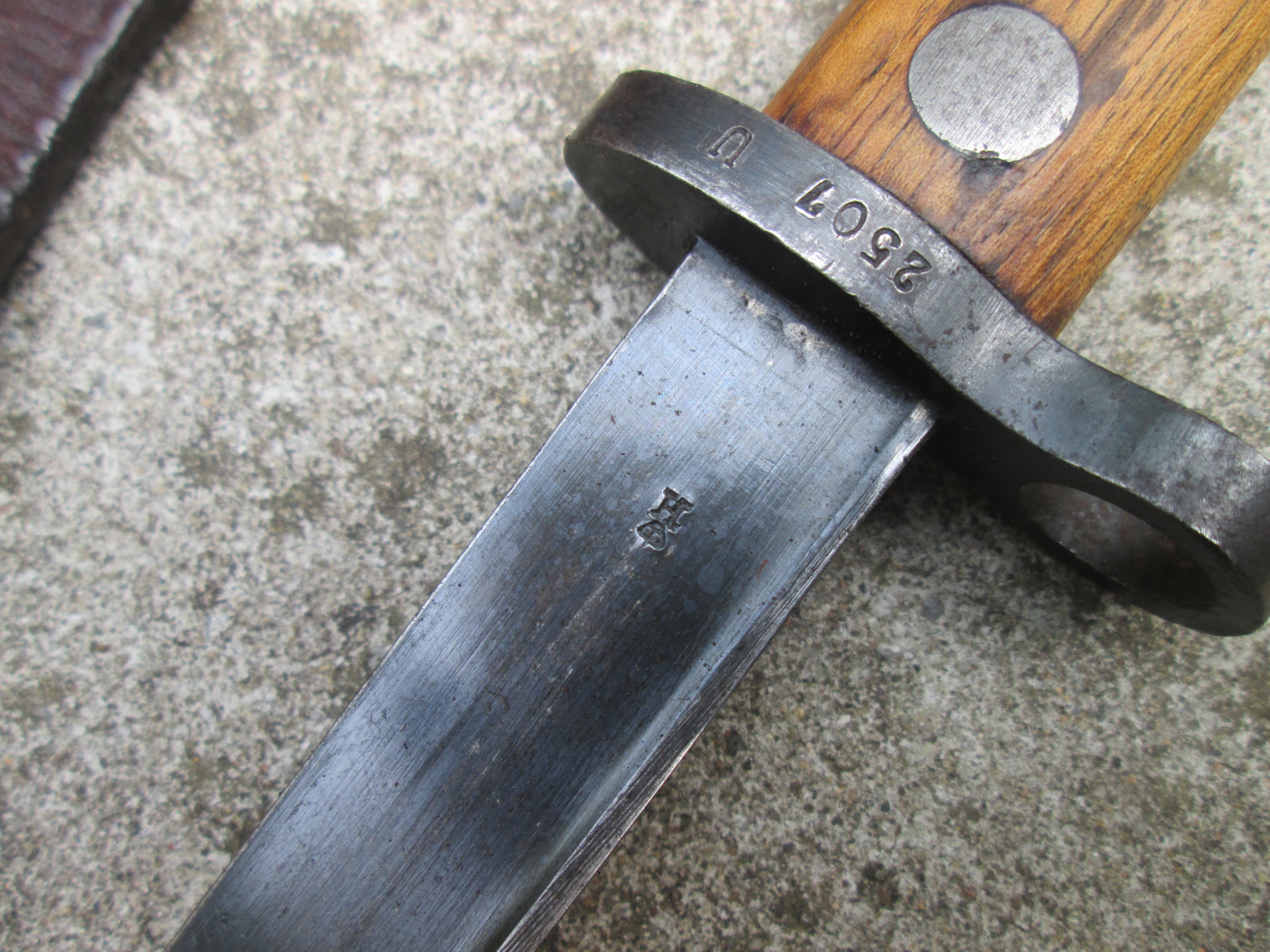 Dutch HEMBRUG bayonet with leather scabbard.