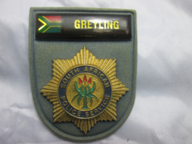 Police indentification badge with name South African Police service. Persoonlijke politie indentificatie embleem borstembleem Zuid- Afrikaanse politie.