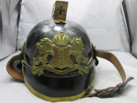 Leather fire department helmet of the City of Amsterdam. Leren Amsterdamse brandweerhelm. zeer nette staat, met brandweerstempel aan de binnenkant.