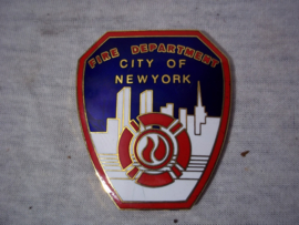 Amerikaans koppelslot Brandweer van New-York, met nog afgebeeld the Empire State Building. Fire department buckle city of New-York.
