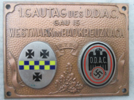 German plaque of the DDAC.  1. Gautag des D.D.A.C. Gau 15 Westmark in Bad Kreuznach 6.7.1934 nicely marked Adam Donner Elderfeld. Leuke aparte plakette met emaile emblemen.