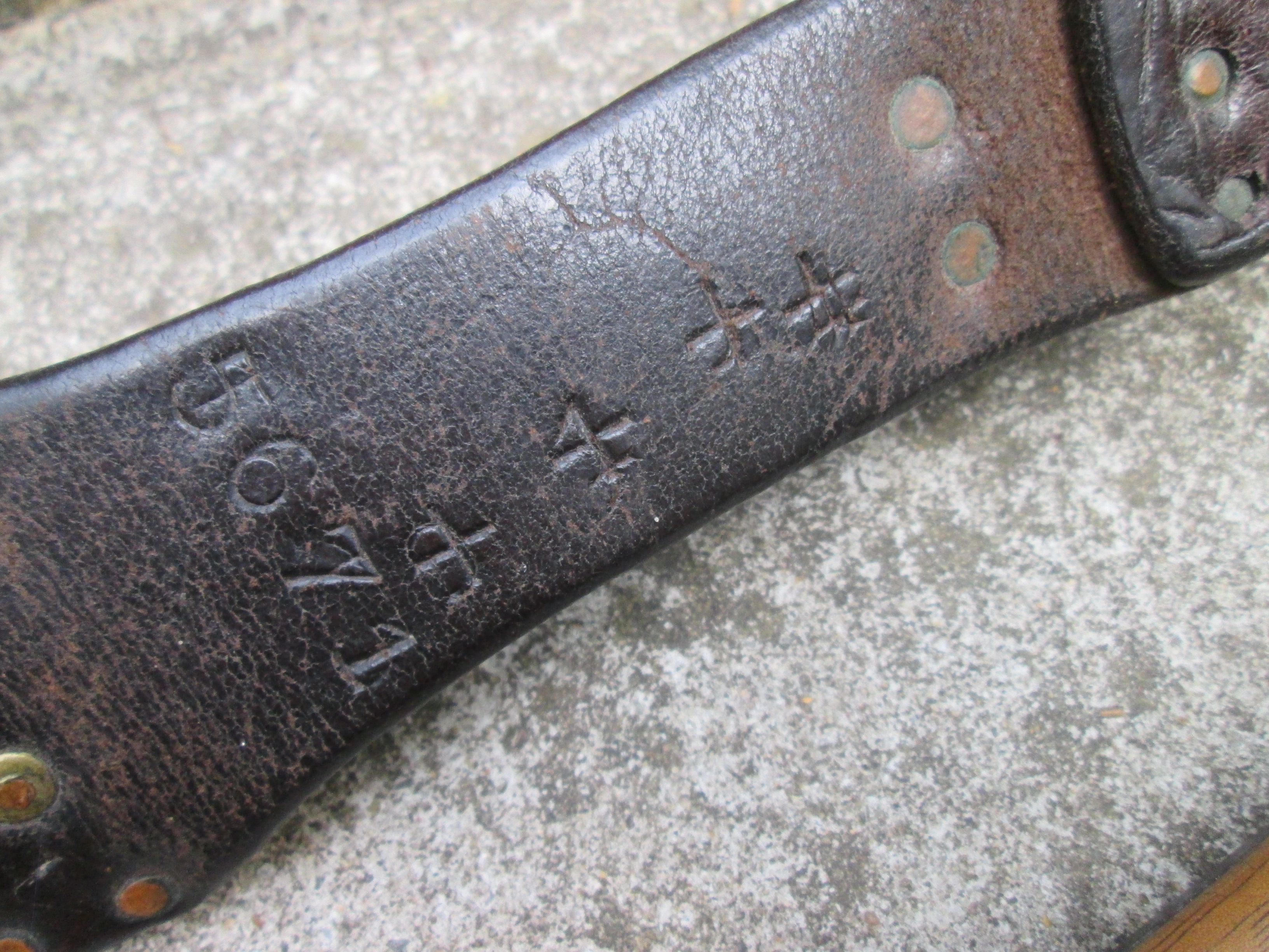 Dutch HEMBRUG bayonet with leather scabbard.