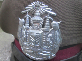 Politiepet Thailand met embleem en etiket